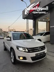  1 فوكس فاجن تيجوان 2012 بنزين متور 2000 تيربو 4x4 فتحة سقف بانوراما فرش بني مميز عداد قليل فحص ممتاز