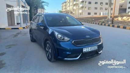  26 كيا نيرو لون كحلي فحص 2 جيد بسعر مغري قابل للبدل