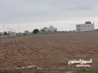  1 مادبا (الخطابية ) قطع اراضي مفروزة سكنية للبيع من المالك مباشرة بدون وساطات وعمولات منطقة فلل
