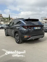  15 هونداي توسان ترخيص 2022 محرك 1600 هايبرد plug in/يقطع على الشحنه 65 كيلو متر