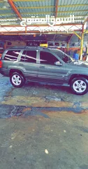  1 جيب شروكي 4700 V8 اوفر لاند  ترخيص واطي موديل 2003  من المالك مباشرة التواصل الجادين فقط