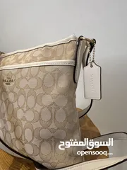  2 Coach signature canvas cross body bag