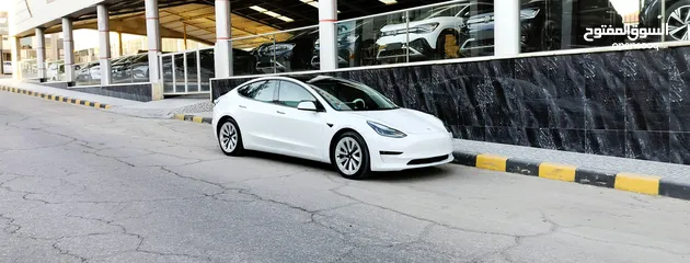  9 تيسلا 2021 model 3 فحص كامل 4 جـيـد فرش ابيض جنط 19بحالة الوكالة لون مميز للبيع بسعر لقطة ومحروووق