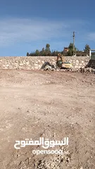  2 بناء سناسل حجريه استصلاح ارض زراعيه  تشييك المزارع تعبيد الشوارع تعبيد الساحات ملاعب شاليهات