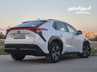  5 Toyota BZ4X موديل 2022 الصنف : LONG RANGE PRO  فحص كامل7جيدجمرك جديدعداد 44 الف*