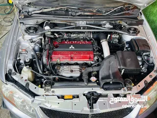  2 Mitsubishi Lancer Evolution 9  وارد اليابان ممشى قليل بحالة ممتازه متوفره كامله