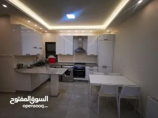  4 شقة مفروشة ارضيه  للايجار في منطقة عبدون .. مع ترس و كراج  / مساحة 120م