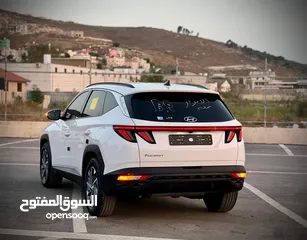  11 هونداي توسان /2022 فل الفل بدون فتحة سقف  2x4 ///240Hp بنزين + كهرباء  ( Haybrid) 1600cc