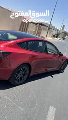 11 تسلا موديل 3 لونج رينج دويل موتور بحالة ممتازة جداً فحص اوتوسكورB+