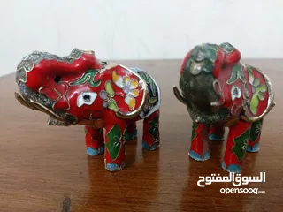  5 An old cloisonné elephant