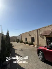  18 شاليه مع مزرعه مميز للبيع منطقة القنيه