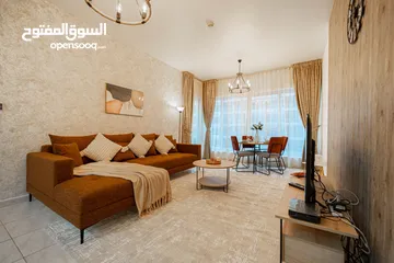  27 دبي لاند SKYCOURT  غرفة وصالة  مفروشة  سوبرلوكس مع بلكونه-إيجار شهري شامل
