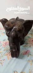  2 wooden  elephant