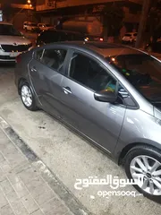  2 السياره المميزه كيا سيراتو 2017_فل اضافات _بنزين _فتحه سقف_ حساسات خلفية وكاميرا خلفيه