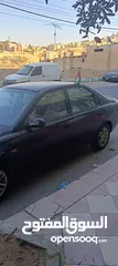  5 كيا شوما موديل 1999 لون اسود فحص 3 جيد