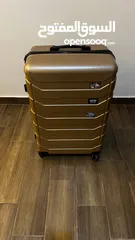  1 ‏شنطة سفر كبيرة  travel suitcase