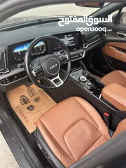  5 كيا سبورتاج هايبرد 2023 / فل كامل مع بانوراما وفرش مميز غرفه عسليه / عداد قليل / سعررر مميز جداً