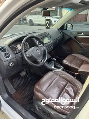  8 فوكس فاجن تيجوان 2012 بنزين متور 2000 تيربو 4x4 فتحة سقف بانوراما فرش بني مميز عداد قليل فحص ممتاز