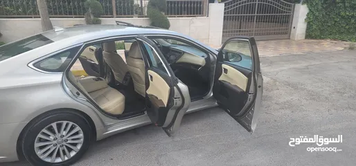  26 تويوتا افالون هايبرد 2015 فل كامل وأعلى صنف Limited وارد و مواصفات أمريكيه مالك واحد فحص كامل