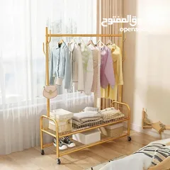  5 ستاند الملابس الذهبي رَتّب غرفتك وعِش أجواء الفخامة  علّق الجواكت والفساتين بكل أريحية