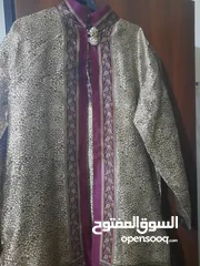  13 مانطو اسود ورمادي وهاد يلي بلصورة وعدة اشياء وفي تنتين مو ديلهم متل العباءة سحاب