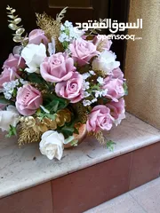  5 artificial flowers  for sell.