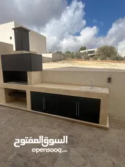  7 بالاقساط شقة ثالث مع روف في اجمل مناطق مرج الحمام خلف مدارس الخمائل