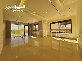  1 شقة طابق اول للبيع في رجم عميش - حجرا، بمساحة بناء 200م