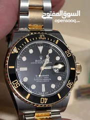  1 ساعة Rolex Submariner Silver and Gold Oyster Bracelet wBlack Bezel فيرست كوبي