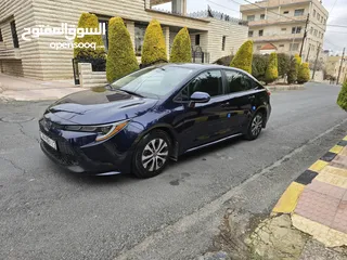  13 تويوتا كورولا 2021 ياباني بطارية ليثيوم قطعت مسافه 30 الف جمرك جديد بسعر مغري جدا