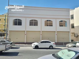  2 محلات ببميزانين  جديدة بالرفاع الشرقى  بقلب سوق الرفاع شارع الشيخ على بن خليفه