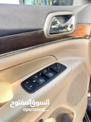  14 جراند شوروكي 2016 محرك بنزين بقوه 3600cc جير اوتوماتيكي مكون من 8 سرعات نظام دفع رباعي امريكي مميز