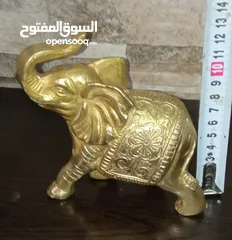  12 فيل نحاس منقوش