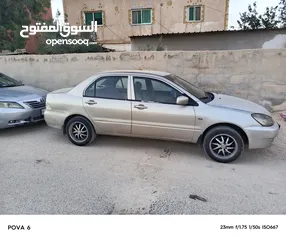  7 لانسر موديل 2005 قير عادي متور 1300