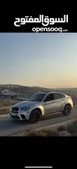  2 Bmw x6 2009 محوله 2012 ما بنقصر مع الي بدو اياها
