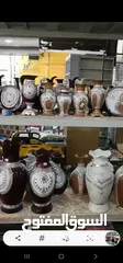  6 رفوف خشب وزجاج وسوبرماركت وقرمه ولوحة اعلانات و معرش زينكو وأبواب سيكريت مظله وألواح خشب تعليق وشبك