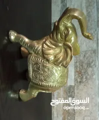 17 فيل نحاس منقوش