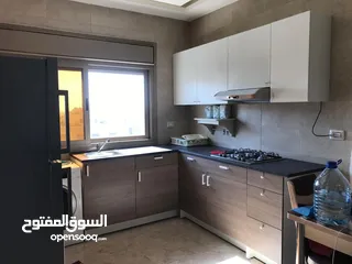  13 شقة راقية مفروشة للإيجار مقابل البوابة الشمالية - Modern furnished apartment for rent