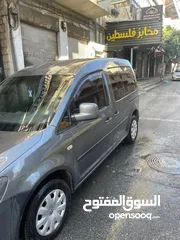  1 كادي 2011 ماشية 165 فحص ممتاز مقاعد 6+1