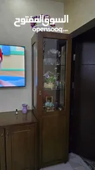  1 طقم كنب جلد + فضيه عدد 2 + دورسوار