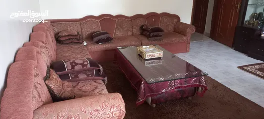  5 sofas and a table