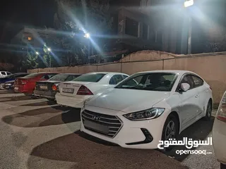  4 هيونداي أفانتي 2018 - لون أبيض - بسعر 11,500 دينار ترخيص عام كامل حتى شهر ستة 2026