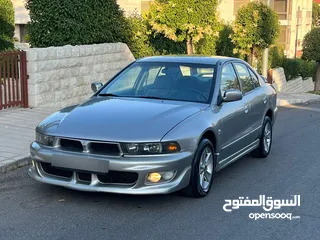  7 متسوبيشي جالنت نظيفه جدا 2005 لون شمباني جير اتماتيك تب اترونك صيانه كامله بالوكاله مالك شخص واحد