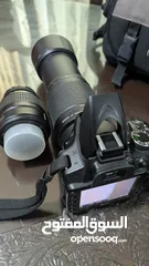  1 كاميرا نيكون DSLR D3200 مع عدستين 300 ميليمتر و55 ميليمتر
