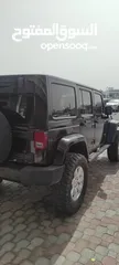  4 Jeep Wrangler Unlimited Sahara 2014 Black