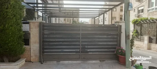 2 بواب حديد خارجيه ثقيله شبه جديده