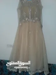  2 فستان خطوبة وعقد راقي جداً بسعر خيااالي ب25الف ريال يمني فقط