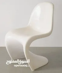  7 4 White Authentic Verner Panton (by Vitra) Chairs.