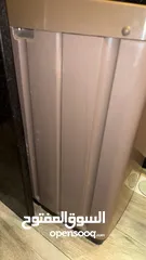  4 غسالة أوتوماتيك نوع weili تغذيه علويه 7 كيلو مش مصديه بحاله ممتازه استعمال خفيف جدا