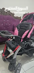  2 عربة أطفال مزدوجة مع هدية مفاجأة " بحالة ممتازة  وارد اميركا مناسبة لطفلين (طفل رضيع في المقدمة +طفل